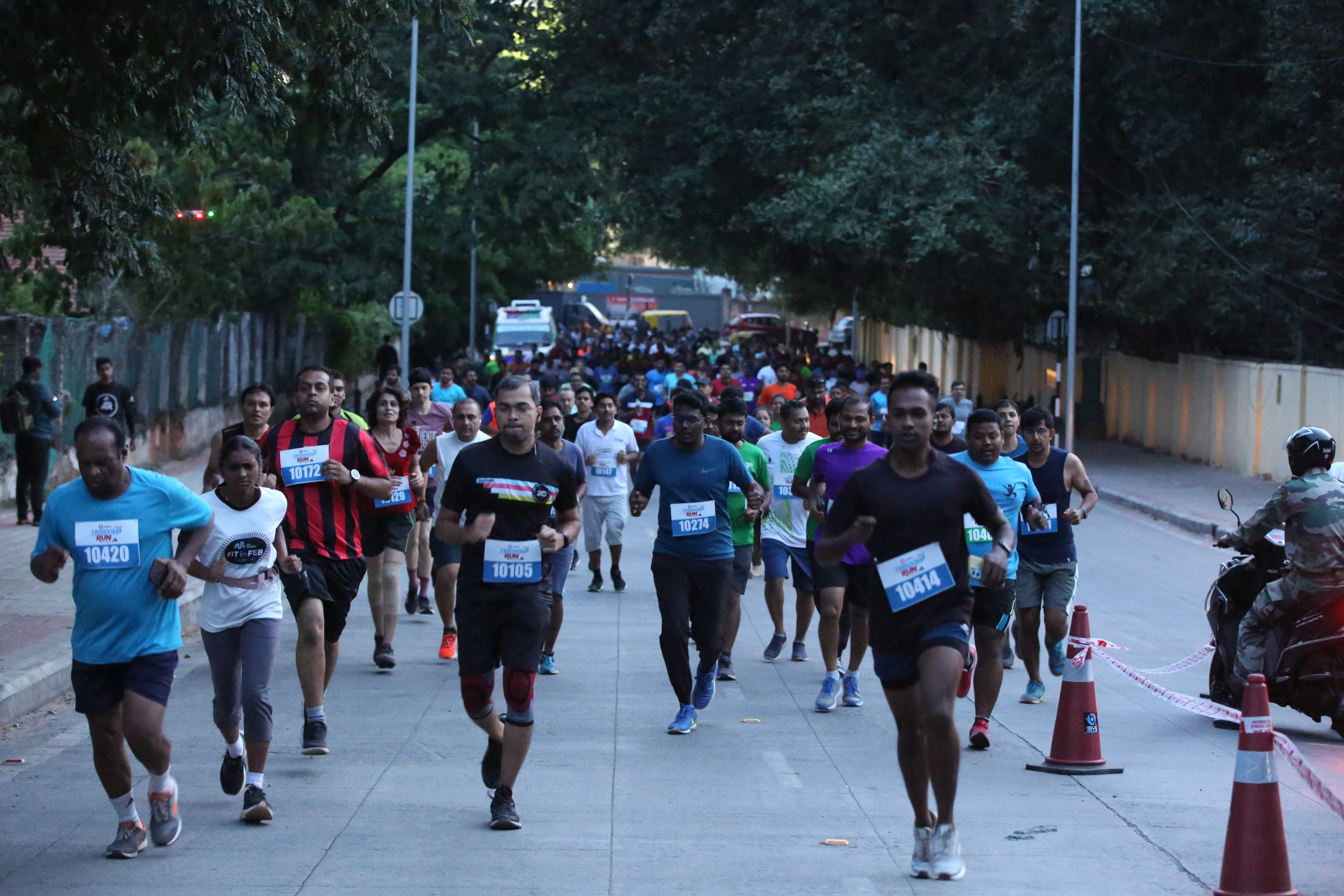 Runners crossing the finish line together